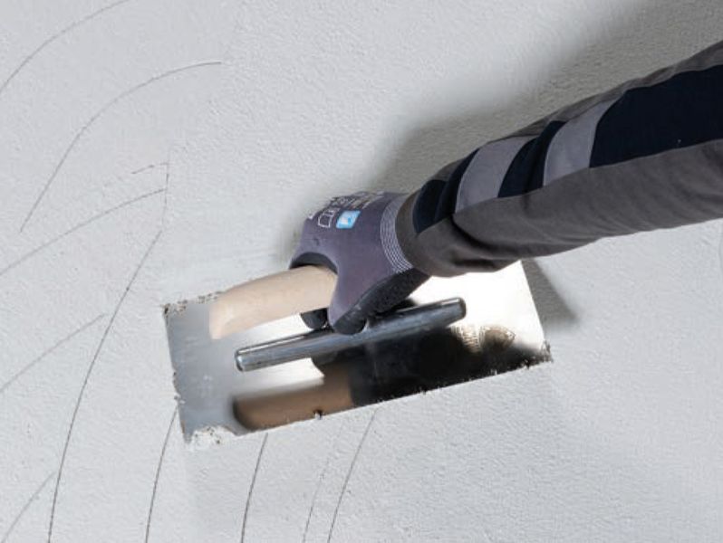 Tweede afdichtingslaag tegellijm aanbrengen